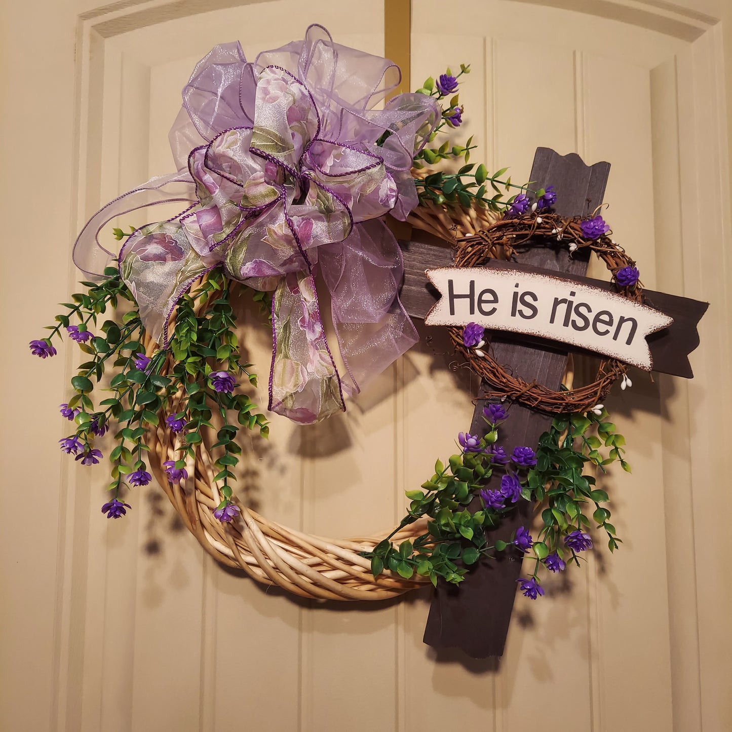 "He is Risen" natural GV wreath with purple flowers