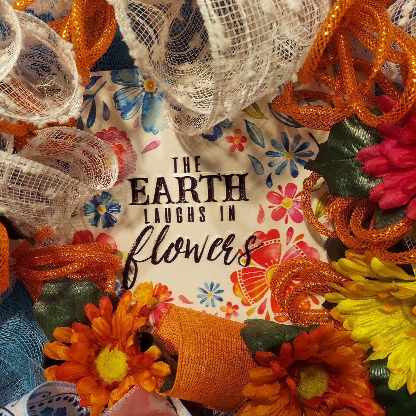 The Earth Laughs in Flowers